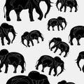 Seamless pattern with the silhouette of an African elephant. Vector hand-drawn illustration isolated on white background Royalty Free Stock Photo