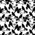 Seamless pattern with silhouette of birds sitting on twigs. Vector background with branches of tree. Royalty Free Stock Photo