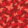 Seamless pattern with silhouettes of butterflies on a red background.