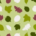 Seamless pattern with silhouettes of leaves of trees of an oak, a birch, a linden. Hand drawn.