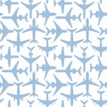 Seamless pattern with silhouettes of passenger airplanes on white background