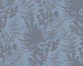 Seamless pattern with silhouettes of tropical palm leaves and branches