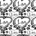 Seamless pattern with single word `love` and roses silhouettes.