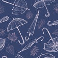 Seamless pattern of sketches various falling leaves and closed and opened umbrellas