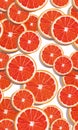 Seamless pattern slice orange fruits overlapping on white background with shadow. Grapefruit vector