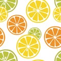 Seamless pattern with slices of lemon, orange and lime on the white background. Royalty Free Stock Photo