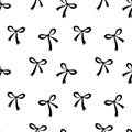 Seamless pattern with small black flat bows, ribbons. Cute fun simple abstract vector background, texture