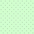 Seamless pattern - small dark dots on a greenish aquamarine background. Moderate graphic texture for design.