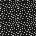 Seamless pattern with small flowers on a black background