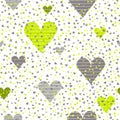 Seamless pattern of small and high volume yellow and gray hearts on white background. Vector illustration in trendy color palette