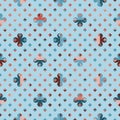 Seamless pattern of small and large colourful four leaf clover symbols on blue background.