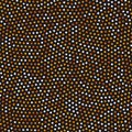 Seamless pattern with small orange circles. Minimalist dots on black background. Vector texture. Royalty Free Stock Photo