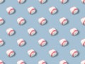 Seamless pattern of small white red ball for baseball sport game on blue background Royalty Free Stock Photo