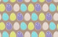 Seamless pattern with smiling Easter eggs