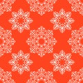 Seamless pattern with snowflakes on a red background