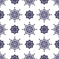 Seamless pattern of snowflakes on a white background