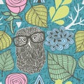 Seamless pattern with spring flora and romantic owls in eyeglasses.