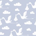 Seamless pattern with storks carrying babies