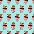 Seamless pattern with strawberry in pink glaze, sprinkle on blue background. Vector, flat