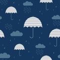 Seamless pattern of striped umbrellas and clouds. Rainy background