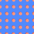 Seamless pattern in the style of polka dot blue Lego and red coral.