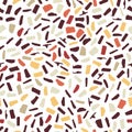 Seamless pattern in the style of terrazzo. In brown, red, yellow, white colors. Royalty Free Stock Photo