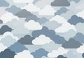 Seamless pattern of stylized clouds in varying shades of gray and blue Royalty Free Stock Photo