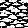 Seamless Pattern of Stylized White Clouds on a Black Background Royalty Free Stock Photo