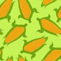 Seamless pattern with sweet corn on green background. Royalty Free Stock Photo