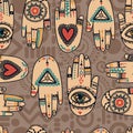 Seamless pattern with tattooed hands and ethnic or esoteric symbols