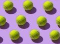 Seamless pattern with tennis balls on a light purple background Royalty Free Stock Photo