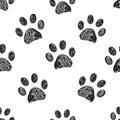 Seamless pattern for textile design. Black and white paw print pattern