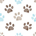 Seamless pattern for textile design.  Brown and blue colored paw print background Royalty Free Stock Photo