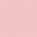 Seamless pattern for textiles and wallpaper - small black polka dots on a pink background.