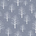 Seamless pattern texture background with winter trees branches and snow
