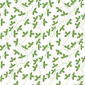 Seamless pattern. Thin green delicate twigs with leaves isolated on white background.