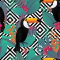 Seamless pattern with Toco toucan bird and tropical leaves and f Royalty Free Stock Photo