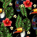 Seamless pattern of Toucan embroidery patches with tropical flowers and leaves.