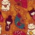 Seamless pattern with traditional asian souvenirs^ hand paper fans, kokeshi dolls, maneki neko and sakura flowers Royalty Free Stock Photo