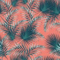 Seamless pattern with tropical leaves. Bright green palm leaves on the orange background. Royalty Free Stock Photo