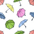 Seamless pattern with umbrellas. Cute colorful autumn background