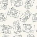 Seamless pattern with vector retro hand drawn hipster photo camera