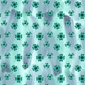 Seamless pattern with watercolor clover leaves. Shamrock background.