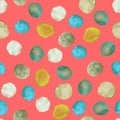 Seamless pattern with the watercolor green, yellow, mint spots (blots) hand drawn on a coral background Royalty Free Stock Photo