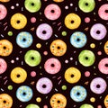 Seamless pattern with watercolor multicolored donuts isolated on black background Royalty Free Stock Photo