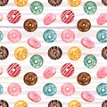 Seamless pattern with watercolor multicolored donuts on striped background Royalty Free Stock Photo