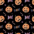 Seamless pattern with watercolor pumpkins illustrations and sweets on black backdrop.