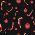 seamless pattern with watercolor red Christmas balls and candy canes on black background. Christmas decorations. Print, packaging Royalty Free Stock Photo