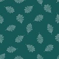 Seamless pattern of white autumn leaves of northern red oak on a turquoise background