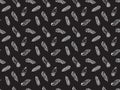 Seamless pattern of white contour bird feathers drawn by hand in the style of zentangle on a black background. Texture for textile